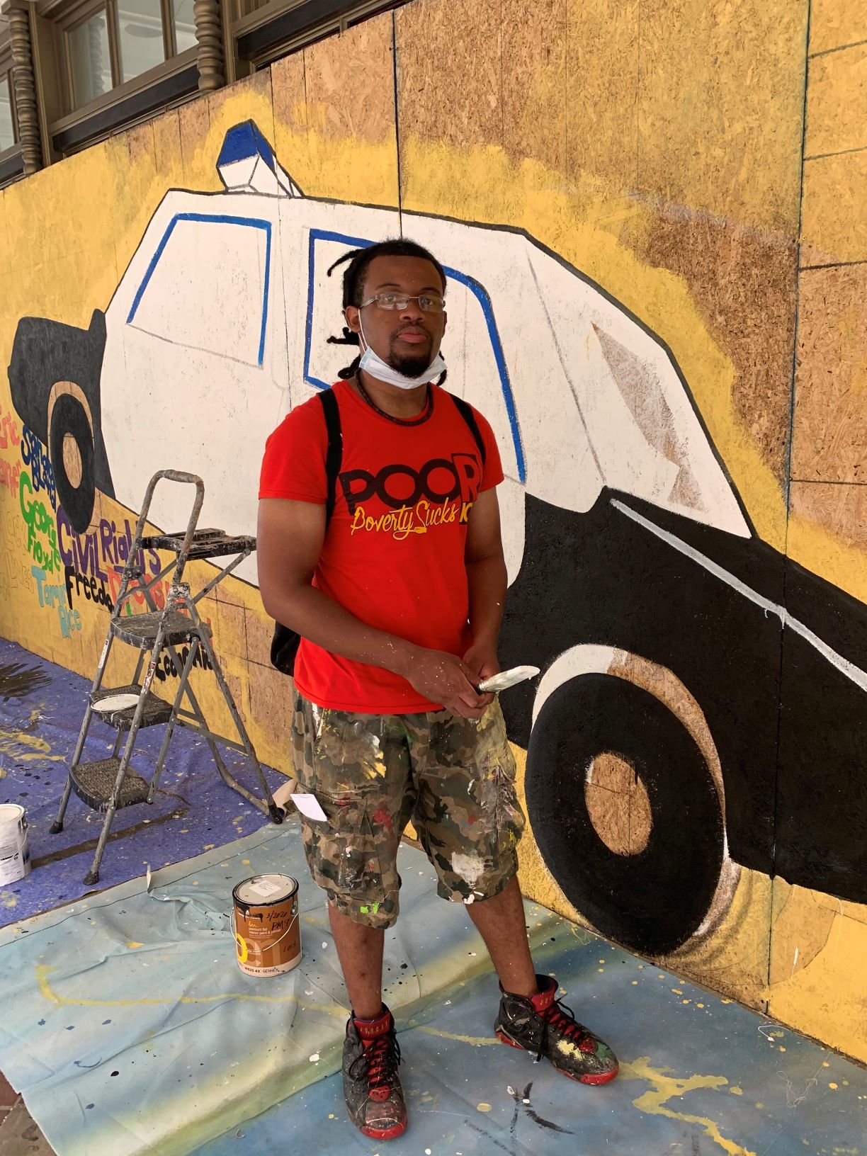 Mechi Shakur with his mural